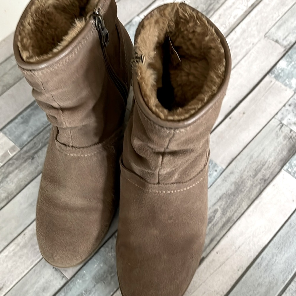 Wedge Ankle Boots with side Zippers, very comfortable. Worn a couple of times.